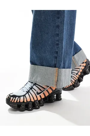 Nike Shox TL sneakers in and orange