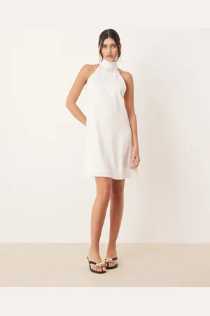 Y.A.S Halterneck mini dress with bow back in