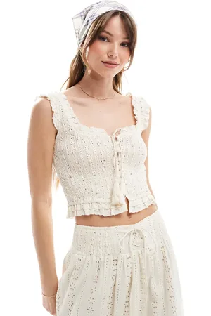 The Frolic Exclusive broderie shirred tie tassel detail crop top in cream - part of a set