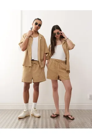 Reclaimed Unisex cord shorts in brown