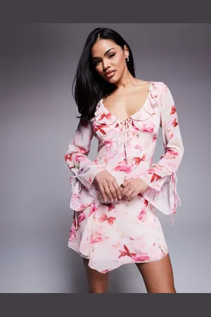 Love Triangle Long sleeve mini dress with ruffle detail in floral