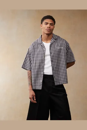 ASOS Boxy oversized camp collar shirt in plaid with chest embroidery
