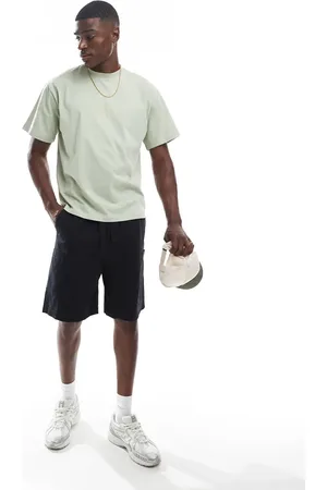 ASOS Mid length cargo jorts with patch detail in