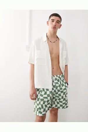 COLLUSION Checkerboard swim shorts in khaki