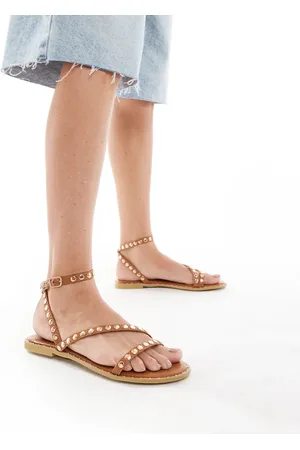 SEQWL Flat sandals with studded straps in tan