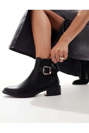 SEQWL Ankle boots with buckle details in