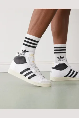 adidas Jabbar high top sneakers in and black