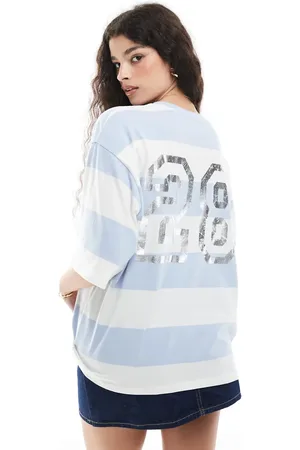 Monki Oversized short sleeve t-shirt with varsity back print in blue and white stripes