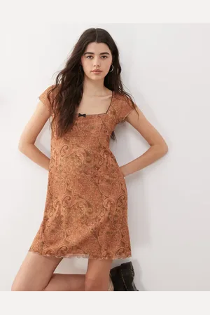 Reclaimed Babydoll mesh mini dress with bow detail in paisley print