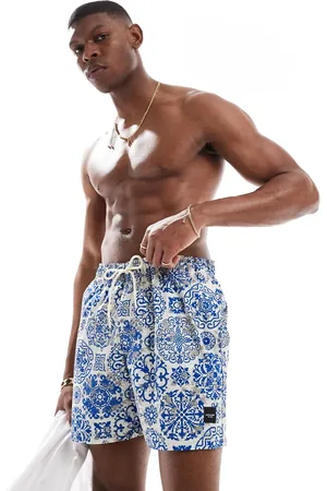 JACK & JONES Swim shorts in white/ tile print