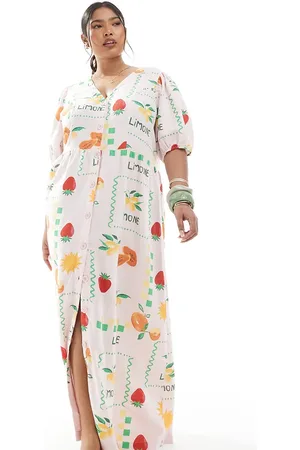Pieces® Pieces Curve puff sleeve button front maxi dress in pale based fruit print