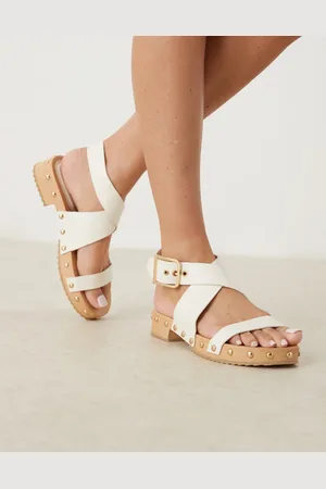 ASOS Fran cross-strap clog sandals in off