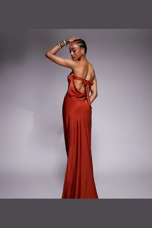 ASOS ASOS DESIGN Tall satin trapeze bandeau maxi dress with bow back detail in rust