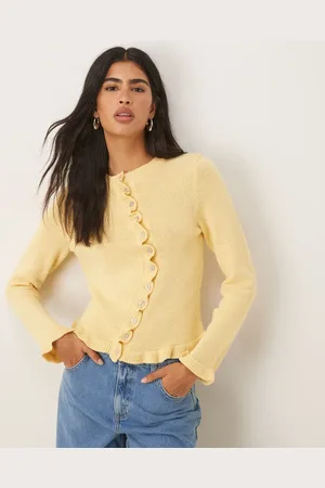ASOS Knit cardigan with irregular placket and ruffle edge in buttermilk