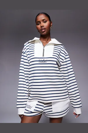 ASOS Weekend Collective long sleeve half zip sweatshirt in navy stripes with scribble graphic embroidery
