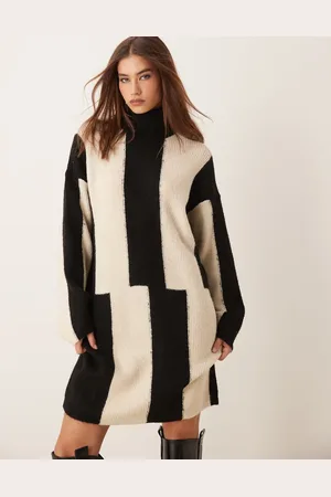 VILA Knit high neck mini dress in abstract print