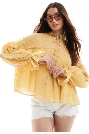 ASOS Tie neck ruffle detail crinkle long sleeve smock top in mustard