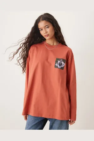 ASOS Oversized long sleeve top with floral back graphic in rust