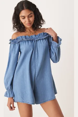 ASOS Soft denim off the shoulder romper with frill detail in light mid wash