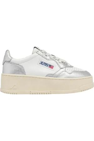Autry Platform Low Sneakers In White And Silver Leather