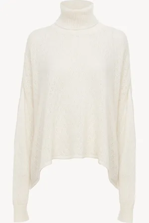 Chloé Generous turtleneck sweater in pointelle knit Size XS 44% Wool, 33% Wool Vicugna Pacos, Farmed, COO Peru, 23% Silk