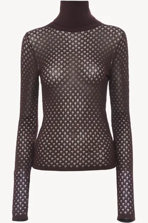 Chloé Fitted turtleneck sweater in lace knit Size M 95% Viscose, 4% Polyamide, 1% Elastane