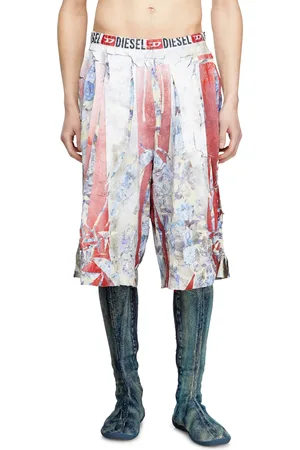 Diesel Floral shorts with cracked over print Shorts