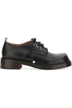 Alexander McQueen Leather derby.