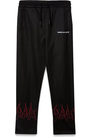 Vision Of Super Pants with red embroidered flames