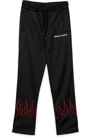 Vision Of Super Pants with red embroidered flames