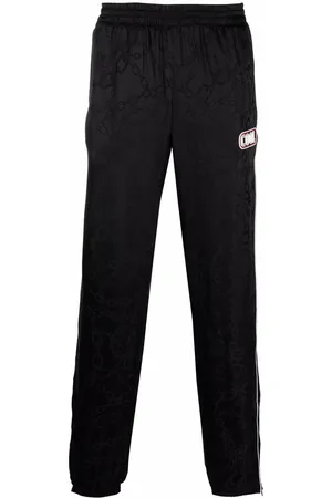 COOL T.M Chain-print slip-on track trousers