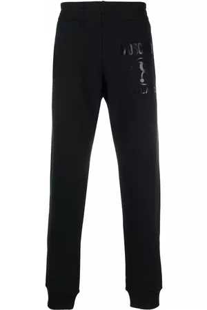 Moschino Men Sweatpants - Logo-print slim-cut joggers - Black