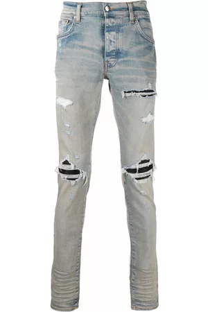 AMIRI Distressed-finish ripped skinny jeans - Blue