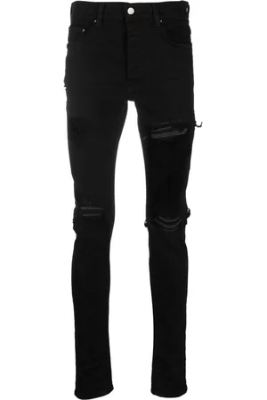 AMIRI Men Skinny Jeans - Distressed-finish ripped skinny jeans - Black
