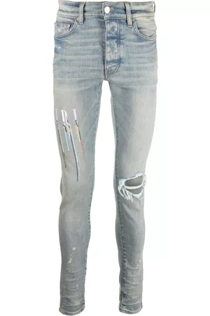 AMIRI Logo-embroidered skinny jeans - Blue