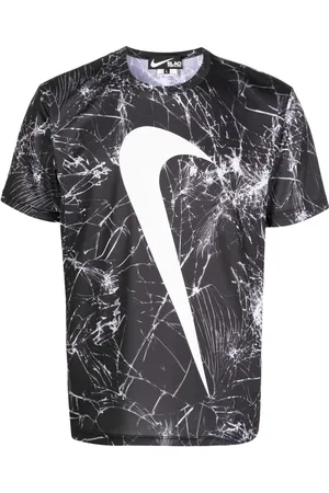 Comme des Garçons Swoosh-print cracked T-shirt