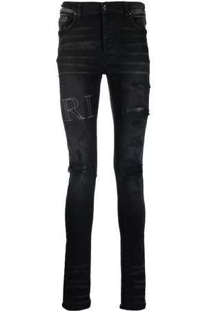 AMIRI Logo-patch slim-fit jeans - Black