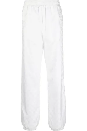 MISBHV monogram-pattern Trackpants - Farfetch