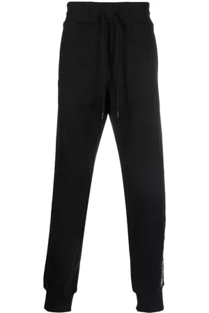 VERSACE Logo-tape cotton track-pants - Black