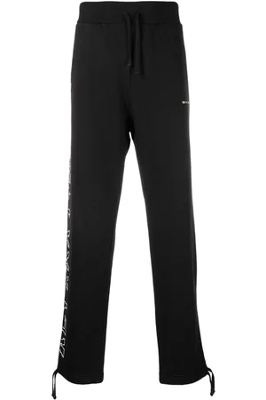 1017 ALYX 9SM Men Sweatpants - Logo-print cotton track pants - Black