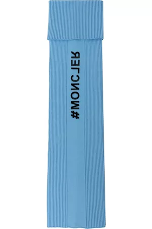 Moncler Embossed-logo leg warmers - Blue