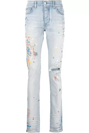 AMIRI Paint-splatter skinny jeans - Blue