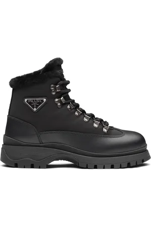 Prada Shearling-trim leather ankle boots