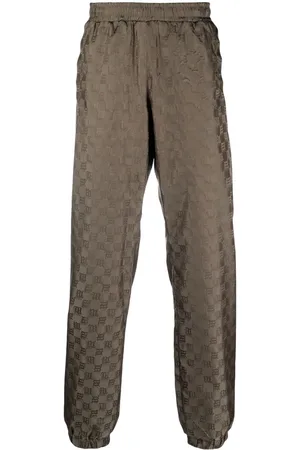 MISBHV Monogram-pattern trackpants