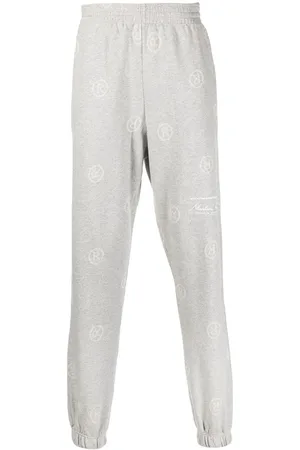 MARTINE ROSE Logo pattern track pants