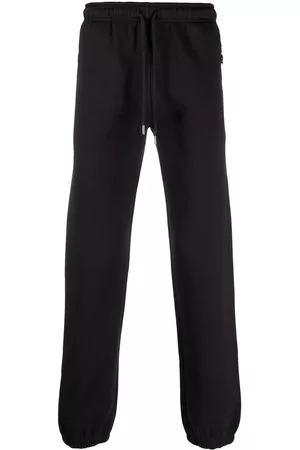 Honey Fucking Dijon Drawstring cotton-blend track pants - Black
