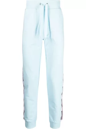 Moschino Men Sweatpants - Logo-tape cotton track pants - Blue