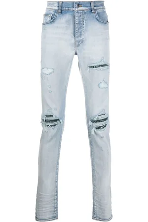 AMIRI Men Slim Jeans - Low-rise slim-fit jeans - Blue
