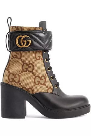 pink and black gucci boots