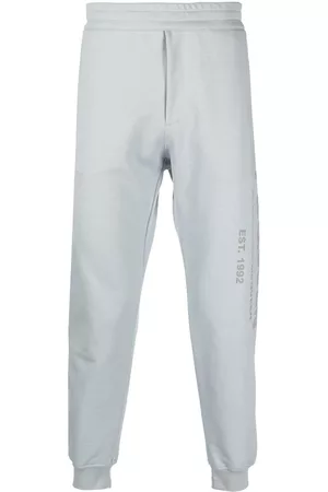 Alexander McQueen Men Sweatpants - Logo-print cotton track pants - Grey